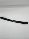 A black elastic headband with the brand name 'VALO' printed in white capital letters, displayed on a light gray background.
